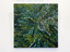 An abstract painting with green and white leaf-like patterns.