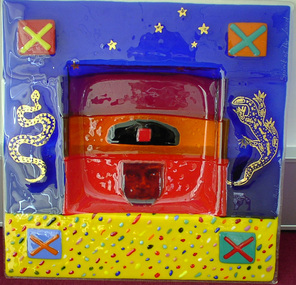 A brightly painted square platter.