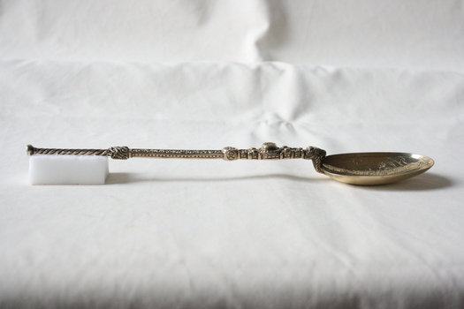 The replica coronation anointing spoon as seen from the side.
