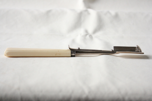 The cheese scoop in the "closed" position.