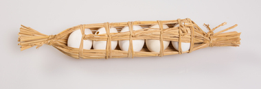 Functional object, Eggs in straw, c. 1900s