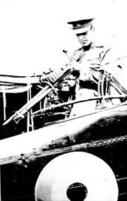 Photograph (item) - Lieutenant Wackett testing machine gun
