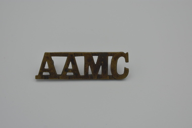Badge (item) - Military Badge, Australian Army Medical Corps (AAMC) Shoulder Title