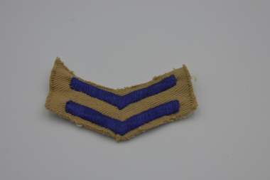 Uniform (item) - Service Chevron, Two Royal Blue Stripes On A Khaki Cloth Background