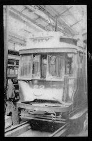 Photograph of Geelong tram 22, damaged following an accident.