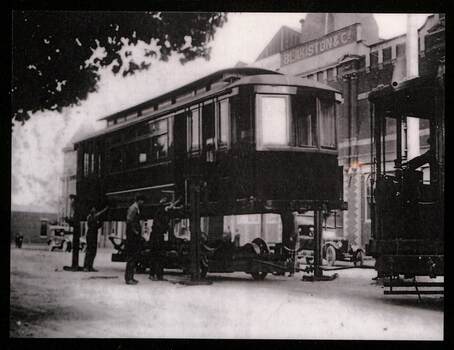 Geelong tram body being fitted with a truck or wheelset