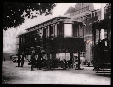Geelong tram body being fitted with a truck or wheelset