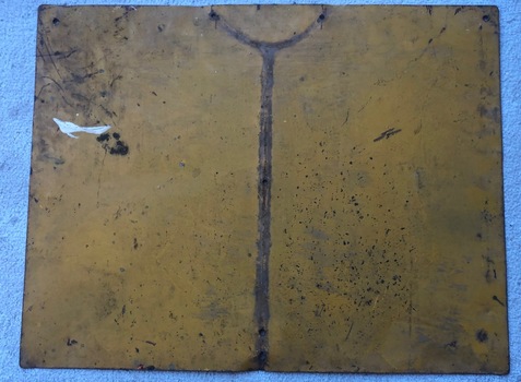 Rear of the sign showing a former stand marking.
