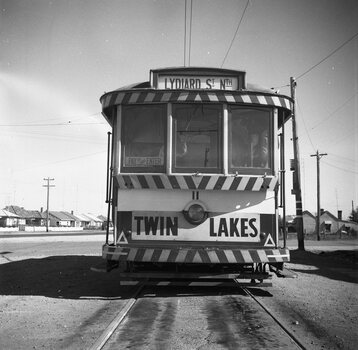 Tram No. 11 at the Sebastopol terminus, Albert St.  Has a Twin Lakes advert.