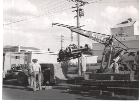 Liftng a Brill 22E bogie onto the truck gooseneck.