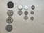 close up of coins compared to Australian coins