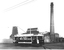 ESCo No. 2 passing Electric Supply Co. (ESCo) power station 