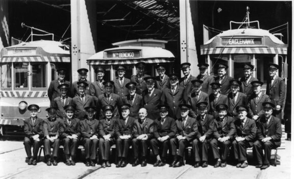 SEC Bendigo staff at closure - black and white of platform staff.
