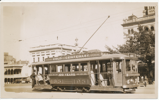 No. 23 painted as the Gold Tram in 1951, at the corner of Sturt and Lydiard St - rear of print.