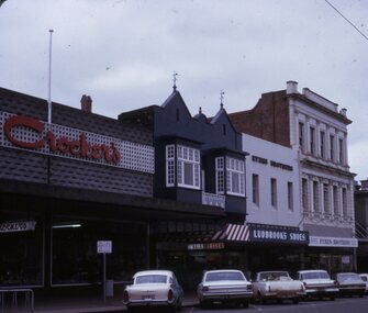 Sturt St with the Crockers, Hairdresser, Ludbrook's shoes and Eyres Brothers shops 