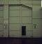 Tram depot front with personell door open