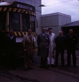 showing various workers at the depot