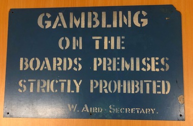Sign - Gambling on Board's premises.