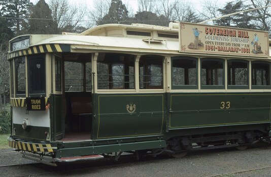 tram33 with the Sovereign  Hill roof advertisement.