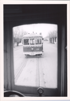Tram 28 from another tram's window.