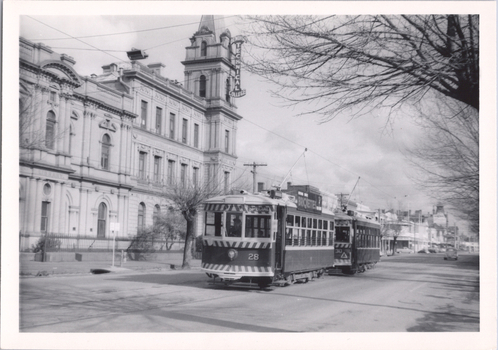 trams 28 and 30 in McCrae St with the Bendigo Technical College building in the background.