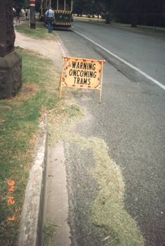  St Aidans Drive with tram 38 and the "Warning oncoming trams" sign