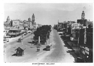 Lower end of Sturt St showing two trams; one travelling West on Sturt St and another travelling East.