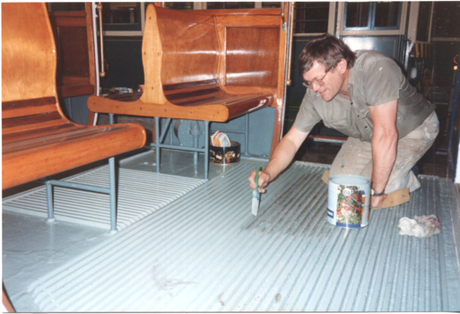 Painting floor of tram 671 - Len Millar