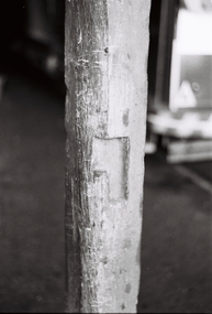 Negative - Notch in wooden column at depot indicating a former horse stall, Robert Green, 30/12/1968