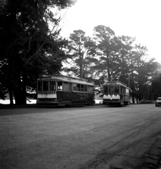 28 and 21 crossing at loop near depot, in twilight.
