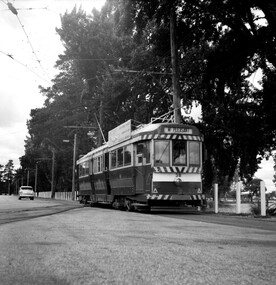  38 passes the depot, westbound.