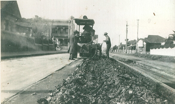 Road surface breaking using a roller