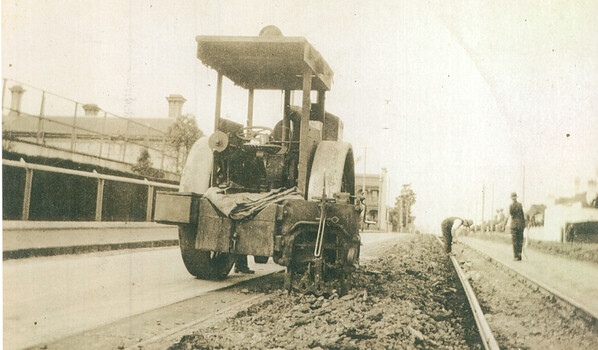 Road surface breaking using a roller