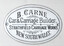 Oval enameled metal plaque with black text on a white background, reading "B. CARNE, Car & Carriage Builder, STRATHFIELD CARRIAGE WORKS, NEW SOUTH WALES."