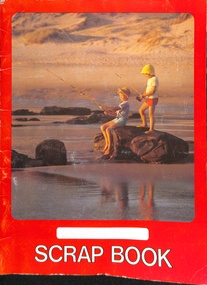 On one side a photograph of two boys fishing and on the other a sailing ship.