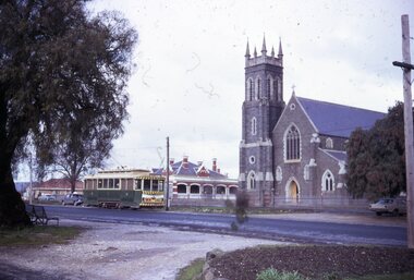 Photograph - Ballarat Tram 11, Shows No 11 travelling up Victoria Street with St Alipius Church in the background, 11 August 1971
