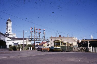 Photograph - Ballarat Tram 40, Tram waiting at level crossing for train to pass through, 19 September 1971