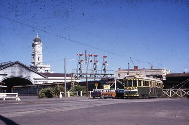 Photograph - Ballarat Tram 40, Tram waiting at level crossing for goods train to pass through, 19 September 1971