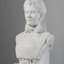 Plaster bust of a woman wearing a stiff, flat garment with medical cross on the chest and a large bow at the neck. Her hair is swept back. She is wearing a nurses cap which has fabric that hangs past her shoulders. A rose is placed under her chest.