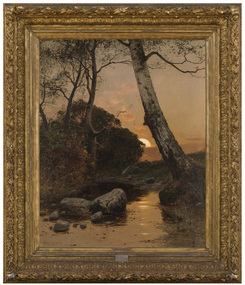 A painting of a landscape in a thick carved and gilded frame. The landscape is painted from a low vantage point, with water at the foreground with small and large rocks scattered throughout. The water is surrounded by overgrown reeds, grasses and trees. In the distance the sun is setting behind clouds. 