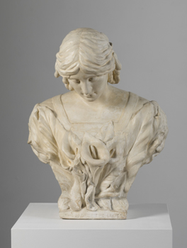 Cream plaster bust of woman. Her hair is parted at the centre, and her head is slightly bowed. She wears a garment with a square neckline. Trumpet lilies cover her bust.