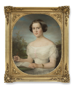 Portrait of young lady in fine dress sketching in a book housed in a decorative gold frame. The sitter has dark hair with middle parting and wears a white lace dress with bear arms. Trees and sky in background.