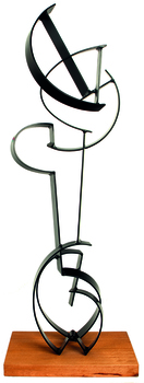 Photo of a black metal abstract sculpture on a small timber base.