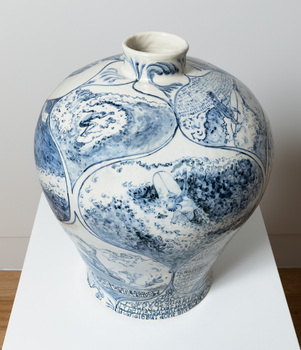Large-scale blue and white ceramic, inspired by early Chinese willow-pattern vessels, depicting images of and social commentary around Victorian surfer Wayne Lynch.