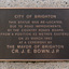 Bronze plaque attached to granite base