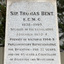 Carved inscription in black on a grey granite plinth