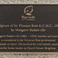 Bronze plaque attached to granite base