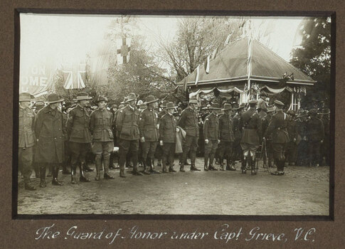 Black and white photograph of a guard of honour of soldiers