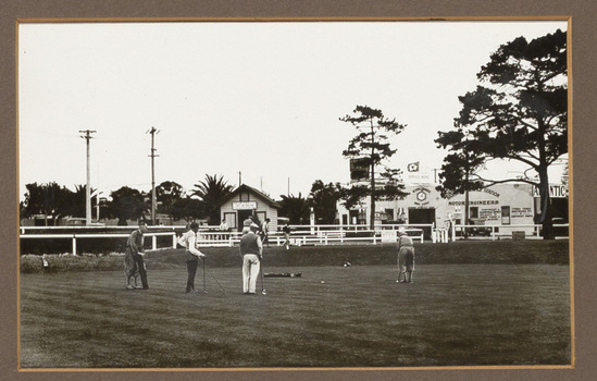 Black and white photograph of croquet game