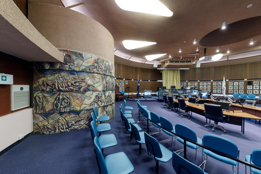 Photograph of a curved ceramic mural within Brighton Council Chambers